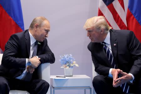 Russia’s President Vladimir Putin talks to U.S. President Donald Trump during their bilateral meeting at the G20 summit in Hamburg, Germany, July 7, 2017 (REUTERS)