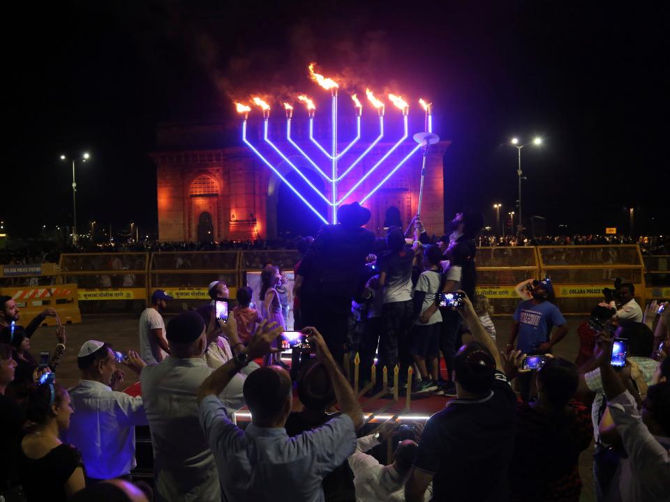 A communal menorah lighting ceremony in Mumbai, India.