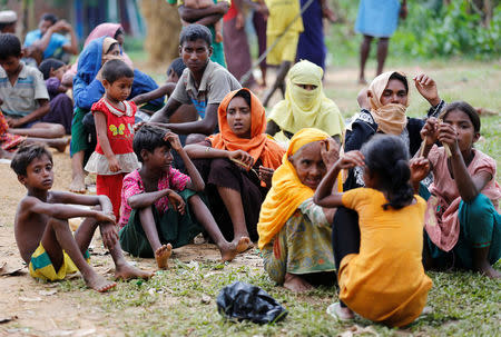 New Rohingya refugees wait to enter the Kutupalang makeshift refugee camp, in Cox’s Bazar, Bangladesh, August 30, 2017. REUTERS/Mohammad Ponir Hossain