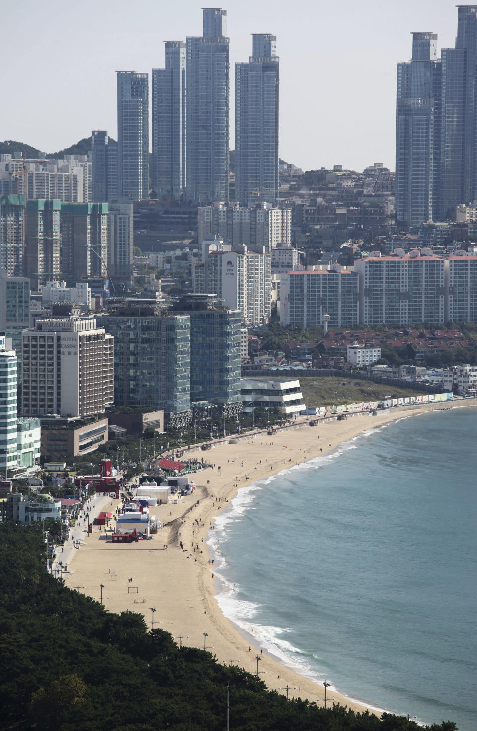 FILE - In this Friday, Oct. 4, 2013 photo, the Busan International Film Festival village is seen on Haeundae Beach as the various events go on in Busan, south of Seoul, South Korea. What would be the price for hiring Asia's biggest movie stars to host the region's largest film event? Hong Kong star Aaron Kwok opened this year's Busan International Film Festival for mere 500,000 won or $465, according to Yang Heon Kyu, who oversees the festival's budget. In 2012, actress Tang Wei accepted the same condition and became the first Chinese to open the festival in South Korea's second-largest city.The goodwill of big-name stars is one indication of how important Busan has become to the Asian film industry in less than two decades. (AP Photo/Woohae Cho, File)