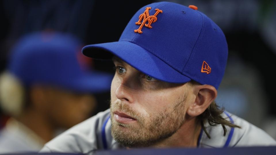 Mar 30, 2023; Miami, Florida, USA; New York Mets second baseman Jeff McNeil (1) looks on from the dugout prior to the game against the Miami Marlins at loanDepot Park.