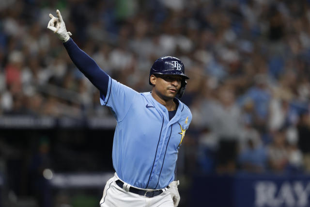 Marwin Gonzalez of the New York Yankees reacts after reaching