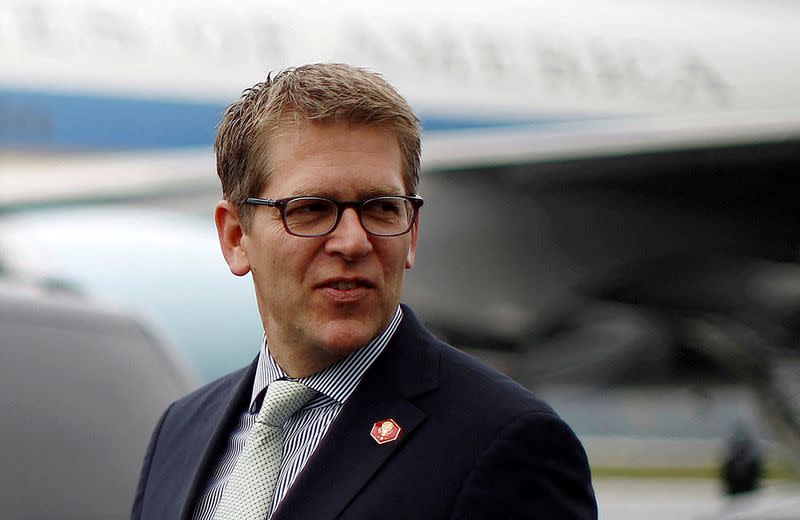 FILE PHOTO: Then-White House Press Secretary Jay Carney is pictured upon his arrival in Swanton