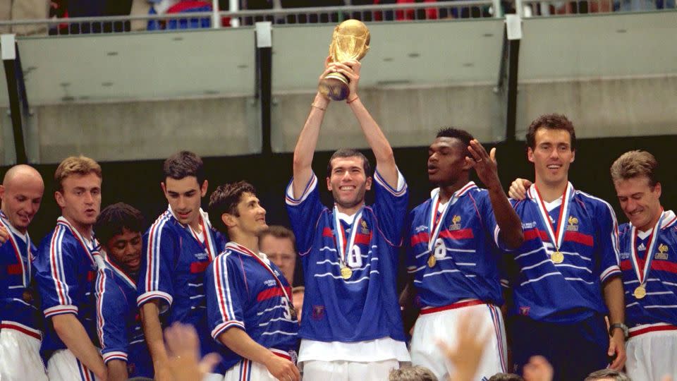 Zinedine Zidane holds the trophy aloft to celebrate France's World Cup final win in 1998. - Action Images/Reuters