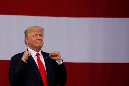 President Donald Trump arrives to delivers remarks. REUTERS/Carlos Barria