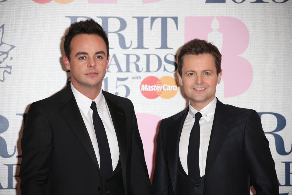 Anthony McPartlin and Declan Donnelly pose for photographers upon arrival at the Brit Awards 2015 at the 02 Arena in London, Wednesday, Feb. 25, 2015. (Photo by Joel Ryan/Invision/AP)