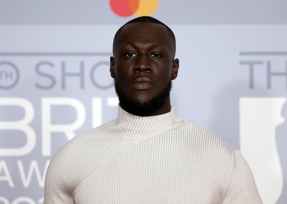 Stormzy poses for photographers upon arrival at Brit Awards 2020 in London, Tuesday, Feb. 18, 2020.(Photo by Vianney Le Caer/Invision/AP)