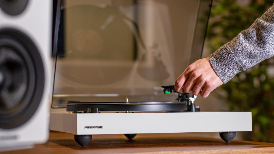 Fluance RT81+ PR image showing stylus being placed on vinyl