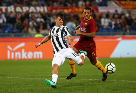 Soccer Football - Serie A - AS Roma vs Juventus - Stadio Olimpico, Rome, Italy - May 13, 2018 Juventus' Paulo Dybala in action with Roma's Juan Jesus REUTERS/Alessandro Bianchi