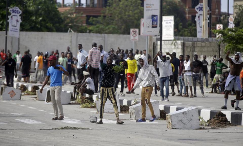 People protest at the Lekki toll gate in Lagos, Nigeria, on Wednesday.