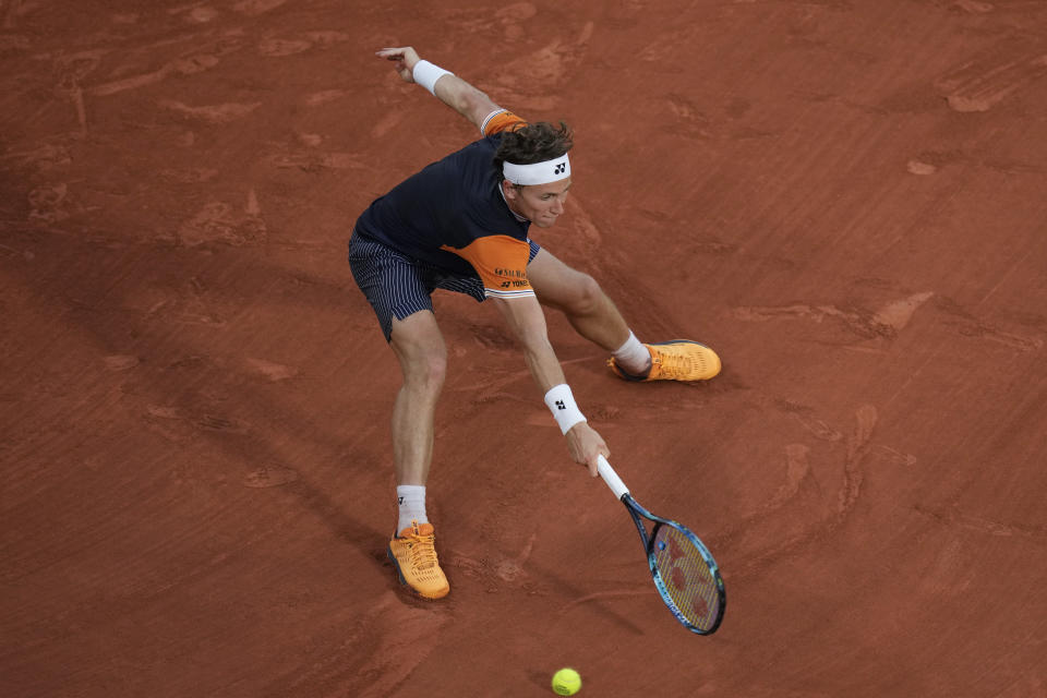 Norway's Casper Ruud plays a shot against Germany's Alexander Zverev during their semifinal match of the French Open tennis tournament at the Roland Garros stadium in Paris, Friday, June 9, 2023. (AP Photo/Thibault Camus)