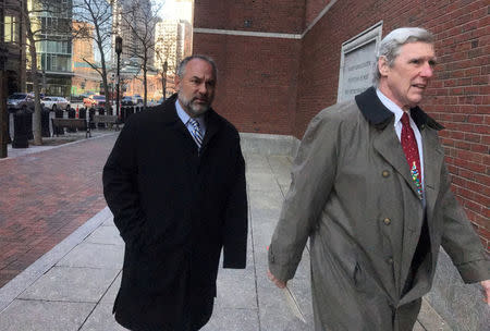 Kenneth Brissette (L), director of tourism, sports and entertainment for the city of Boston and defense attorney William Kettlewell, enter federal court in Boston, Massachusetts, U.S., December 4, 2017. REUTERS/Nate Raymond