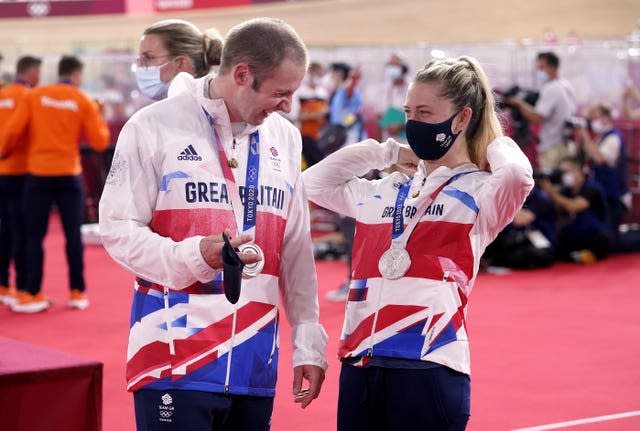 Great Britain’s Laura Kenny and Jason Kenny with their silver medals at the Izu Velodrome 