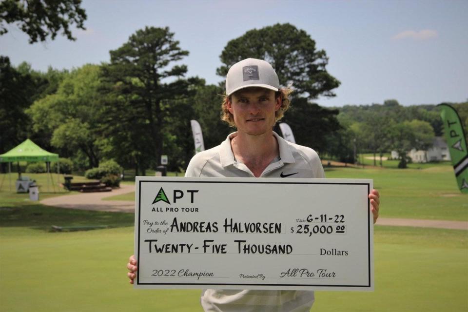 Andreas Halvolsen shown with his $25,000 winner's check from the All Pro Tour's United Way Classic at Hardscrabble Country Club. He won the 2022 event with a 14-under finish in 54 holes.