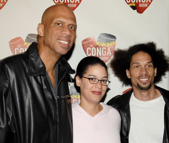 <p>John Shearer/Getty</p> Kareem Abdul-Jabbar, Sultana Jabbar and Kareem Abdul Jabbar Jr. attends the grand opening of the Conga Room at LA Live on December 10, 2008.