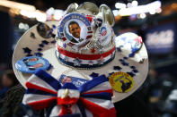 Renee Watson of San Antonio, TX wears a cowboy hat decorated with campaign buttons during the final day of the Democratic National Convention at Time Warner Cable Arena on September 6, 2012 in Charlotte, North Carolina. (Photo by Tom Pennington/Getty Images)