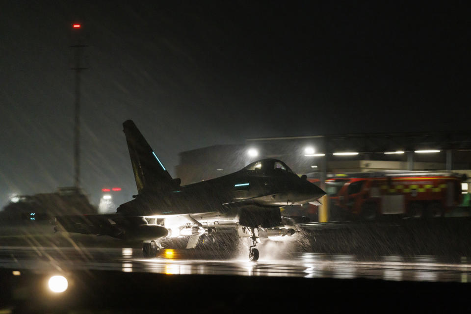 In this image provided by the UK Ministry of Defence, a Royal Air Force Typhoon FGR4 takes off to carry out air strikes against Houthi military targets in Yemen, from RAF Akrotiri, Cyprus, Monday, Jan. 22, 2024. The U.S. and British militaries bombed eight locations used by the Iranian-backed Houthis in Yemen on Monday night, the second time the two allies have conducted coordinated retaliatory strikes on an array of the rebels' missile-launching capabilities. (AS1 Jake Green RAF/Ministry of Defence via AP)