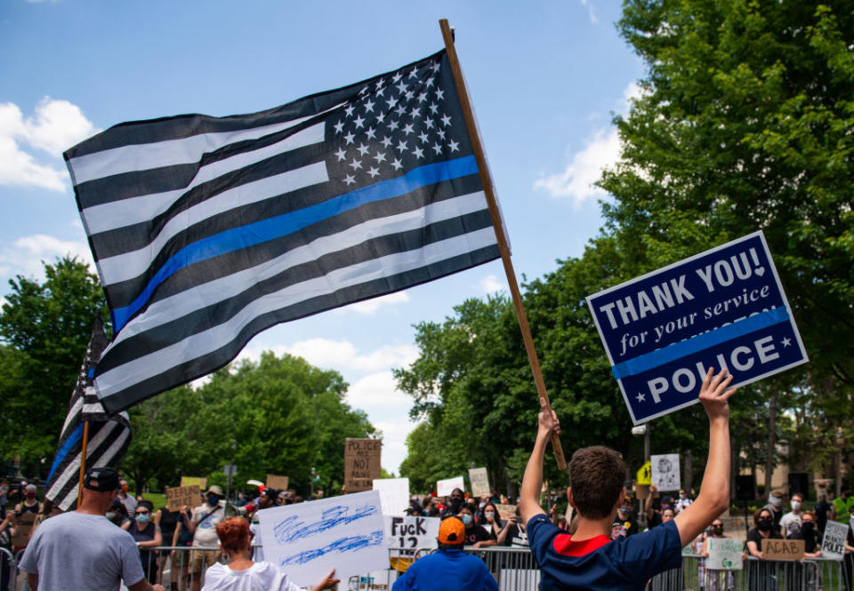 Protesters offered a pro-police message during a “Bikers for 45” rally in June 2020 in St. Paul, Minnesota. The crowd was met with counter-protesters calling for measures to defund the police. (Stephen Maturen<br> / Getty Images)