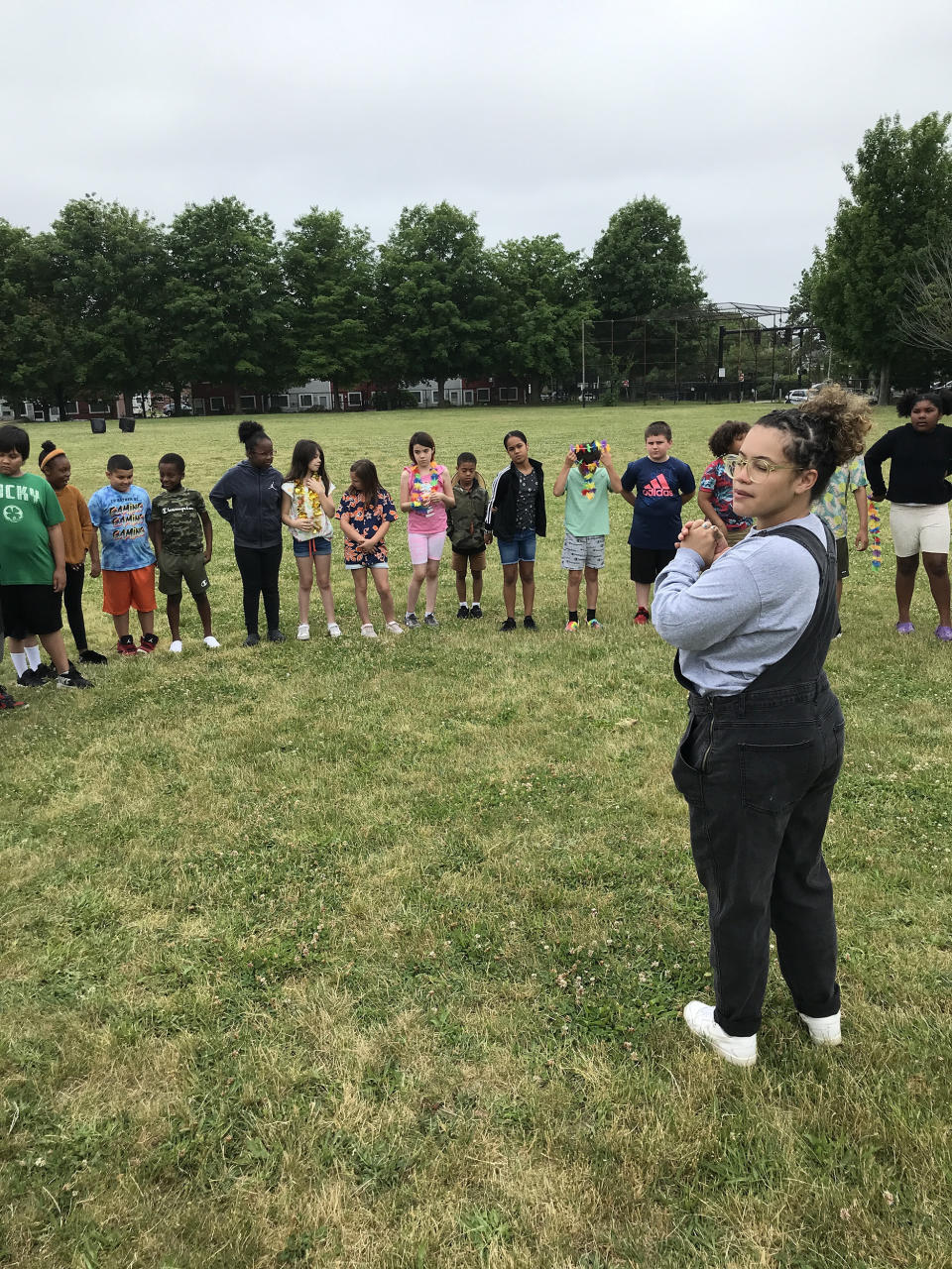 Brooks teaches a group of students as part of a Black History Month lesson by FoodCorps and Grow Initiative. (Courtesy Shalynn Brooks / FoodCorps)