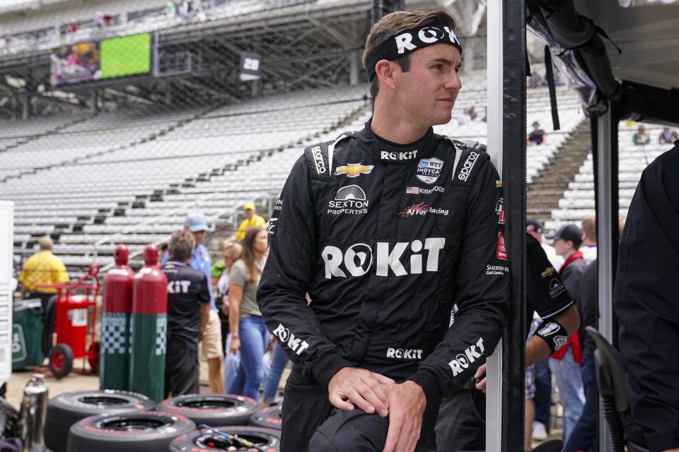 Kyle Kirkwood waits for the start of Friday's final practice for the Indianapolis 500 auto race at Indianapolis Motor Speedway.