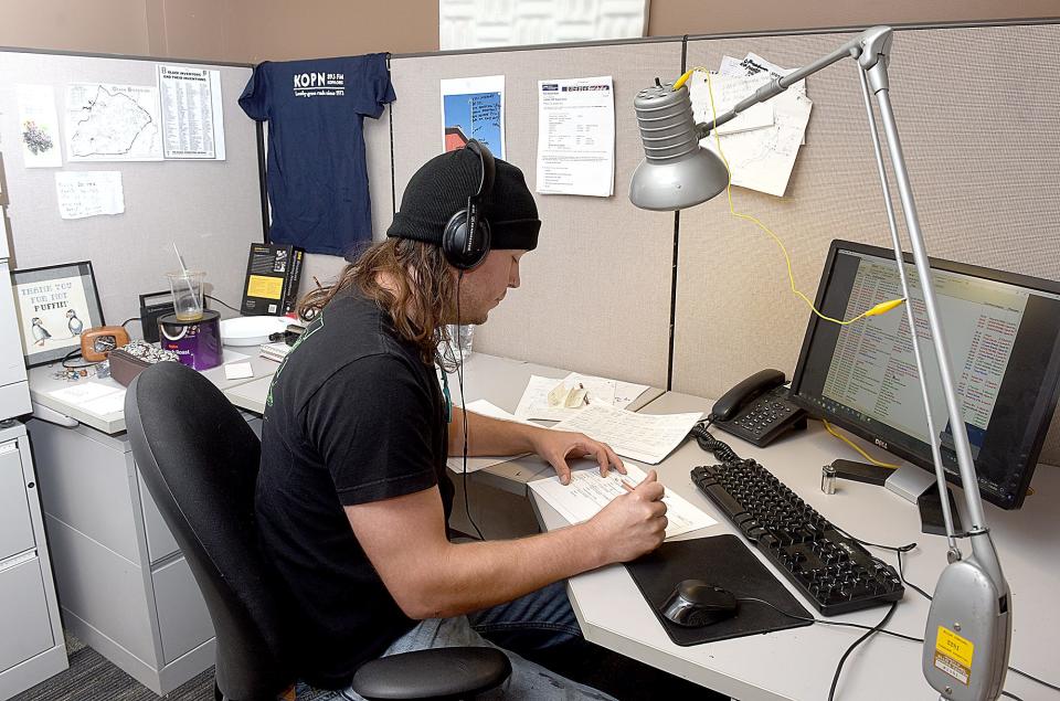 KOPN 89.5 FM Operations Manager Dylan Martin works from his new office at the KOPN studio at 401 Bernadette Drive.