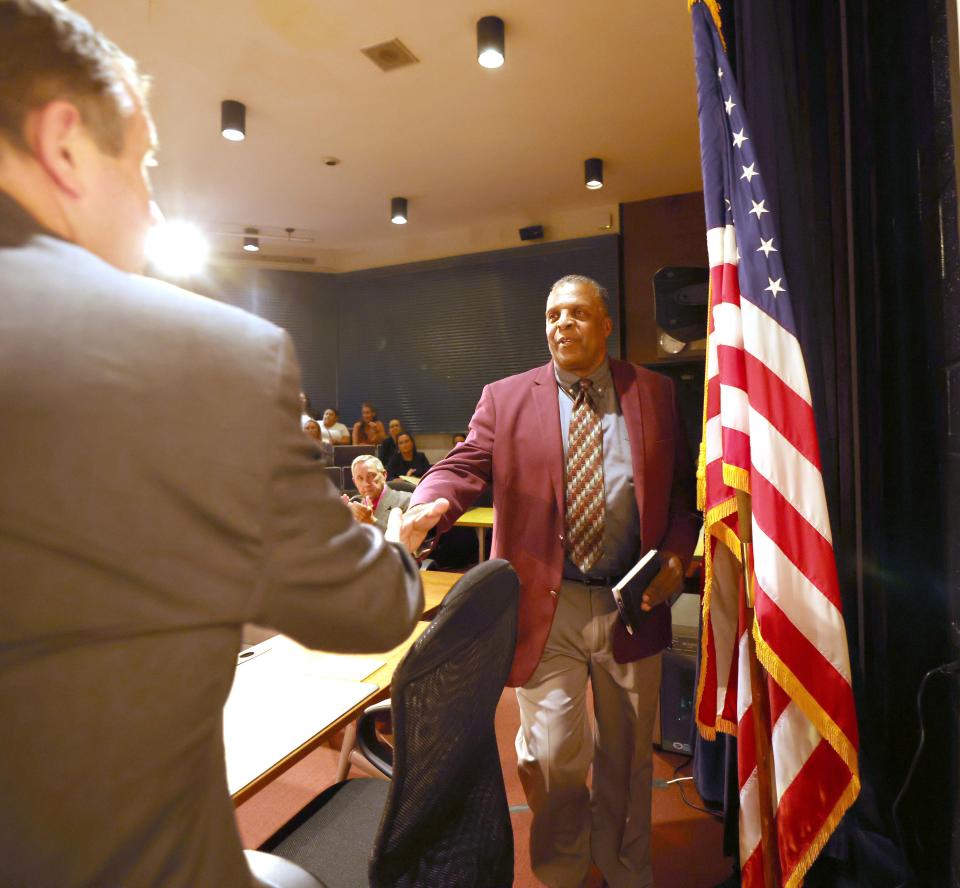 Mayor Robert Sullivan, left, announces James Cobbs as acting superintendent of Brockton Public Schools at an "emergency meeting" of the Brockton School Committee at the high school on Friday, Sept. 1, 2023.