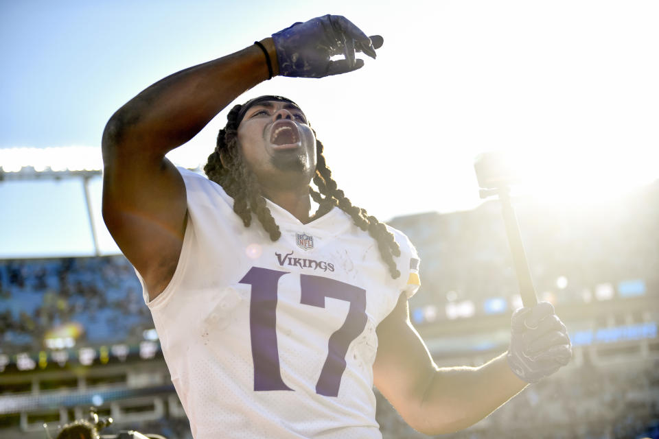 CHARLOTTE, NORTH CAROLINA - OCTOBER 17: K.J. Osborn #17 of the Minnesota Vikings celebrates after the 34-28 overtime win against the Carolina Panthers at Bank of America Stadium on October 17, 2021 in Charlotte, North Carolina. (Photo by Mike Comer/Getty Images)