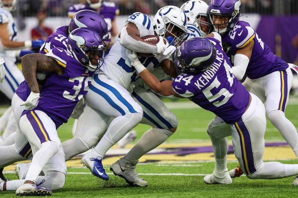 Dec 17, 2022; Minneapolis, Minnesota, USA; Minnesota Vikings linebacker Eric Kendricks (54) makes a tackle on Indianapolis Colts running back Deon Jackson (35) during the first quarter at U.S. Bank Stadium.