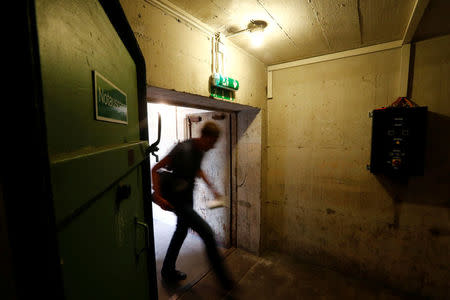 An entrance to the exhibition entitled 'Hitler - How Could it Happen?' about German Nazi leader Adolf Hitler is pictured during a media tour in a World War Two bunker in Berlin, Germany, July 27, 2017. REUTERS/Fabrizio Bensch