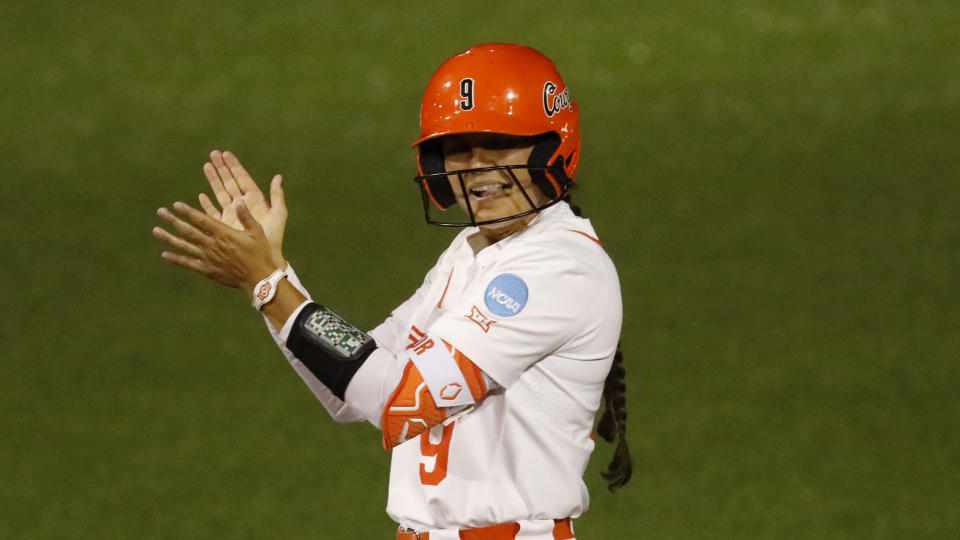 Oklahoma State's Chyenne Factor during an NCAA softball game against Oregon on Thursday, May 25, 2023, in Stillwater, Okla. (AP Photo/Garett Fisbeck)