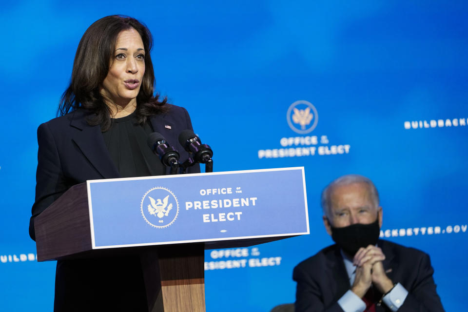 FILE - In this Dec. 8, 2020, file photo President-elect Joe Biden, right, listens as Vice President-elect Kamala Harris, left, speaks during an event at The Queen theater in Wilmington, Del. Black voters were a critical part of the coalition that clinched Biden’s White House bid. The nation will swear in its first Black woman and first person of South Asian descent as vice president, Harris. (AP Photo/Susan Walsh, File)