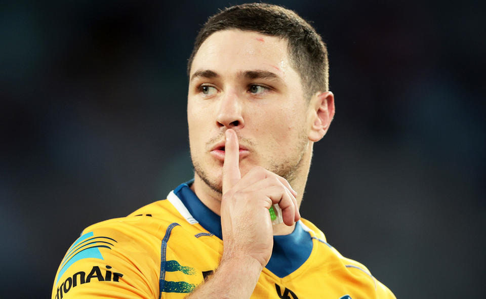 Mitchell Moses, pictured here sending a message to fans as the Eels beat the Wests Tigers.