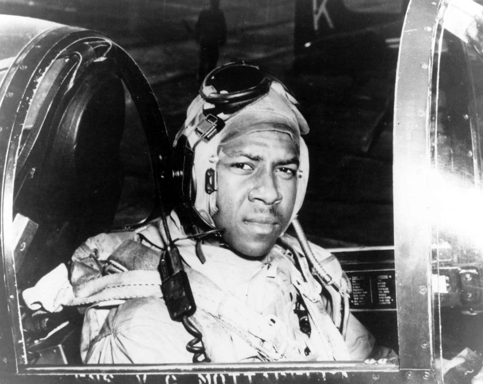 A Black man in a military plane