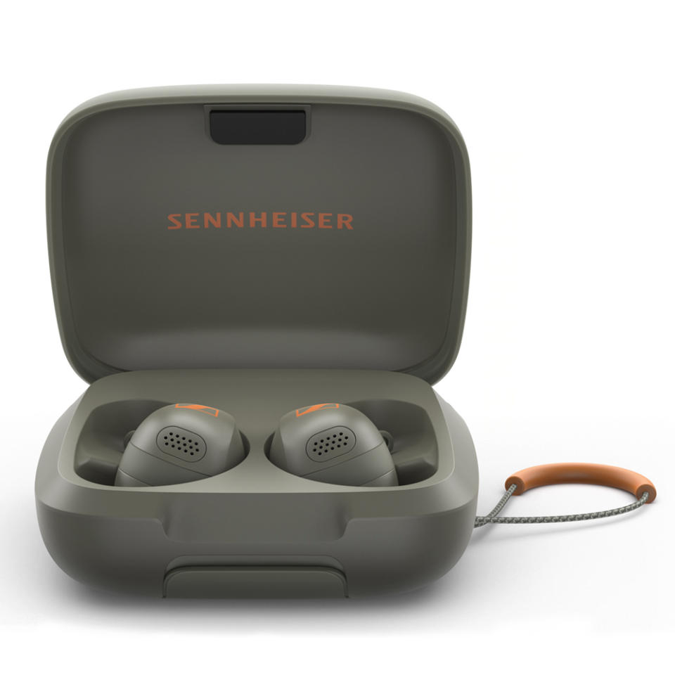 Sennheiser Momentum Sport earbuds in olive in their case.