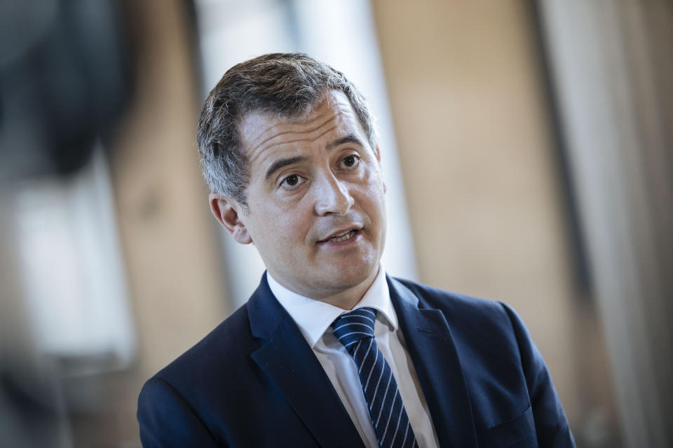 French Interior Minister Gerald Darmanin speaks to the journalists during the Islam de France forum (FORIF) at Palais Iena, in Paris, Saturday, Feb. 5, 2022. The French government on Saturday is introducing a new body meant to reshape Islam in France and rid it of extremism. It will include clergy and laypeople meant to help lead the largest Muslim community in western Europe. (AP Photo/Lewis Joly)