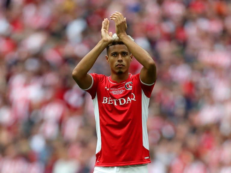 Charlton forward Lyle Taylor has opened up on his experiences of racism in football and called on football’s governing bodies to help players do more to tackle the problem.The last 12 months has seen a rise in the number of high-profile reported cases of racism, with Raheem Sterling drawing praise with his handling of the issue.Taylor revealed he has been told to “f*** off back to my own country” just two weeks before giving an honest and revealing interview with Troy Townsend.“Will it always be there? Yes, in my opinion” Taylor said of racism to Kick it Out campaigner Townsend.“I’ve been racially abused when I was in Scotland, been called a c*** by a Dunfermline fan, I’ve been told to f*** off back to my own country in the last fortnight. I have heard stories from former teammates," he said.“I’ve seen it. You see it on the news…everywhere and to be honest, do I think we can everybody in this country and everybody around the world to the degree that it completely eradicates it…no. You’re still going to have bigots. You’re still going to have ignorants in the world.“When it happened in Scotland, I just scored. The local derby and if I’m honest, right now I could not tell you how I thought at the time because I don’t remember and it was a long time ago now and I’ve gone past that.“With something that happened to me more recently in the last couple of weeks it hurt. It hurt for more than just the racial connotations, it hurt because of where it had come from and the age of the person it had come from, that’s why it hurt so much."Taylor suggested that players should be able to do more to combat racism in football, but there are not acting as they always want to out of fear of punishment by the FA for saying something the governing body may feel they should not.“There is only so much we can do as players because we’re not allowed to say this or that,” he said.“There is only so much we can do before we get reprimanded from the governing body of our sport and it is difficult. There is so much we need to stay and we should have the power and ability to say it all calm, it’s also very difficult to explain to people who haven’t been racially abused how it feels white people have never been victims of oppression, so something almost as trivial as that is washed away, it’s water off a duck’s back.­“If I wanted to send a tweet or whatever it was and I’d have to be very careful on the language used and it didn’t come across as disparagement and I’d have to be very careful that I could not be done for a multitude of things.”Watch Lyle Taylor’s full interview with Kick it Out campaigner Troy Townsend here.