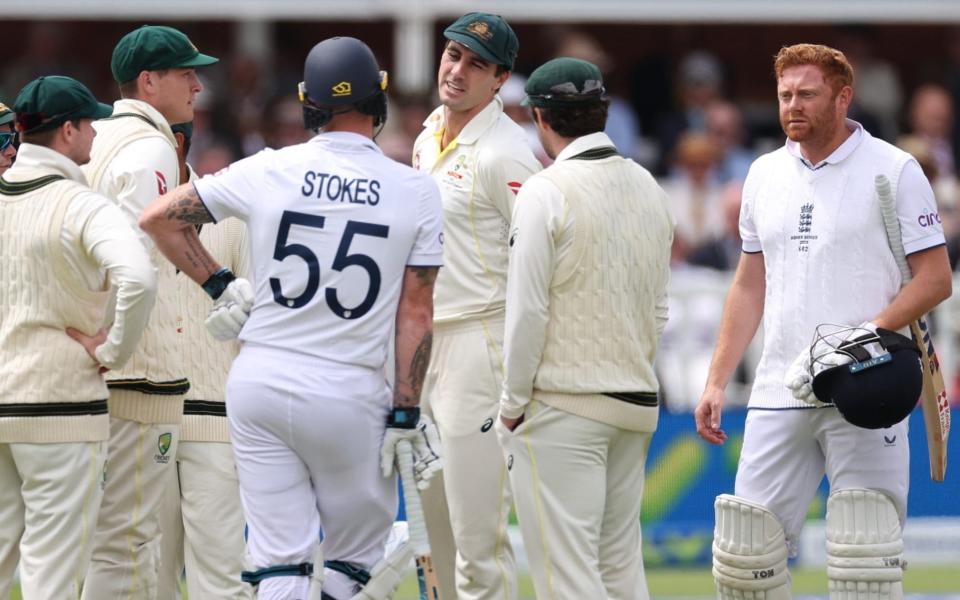 Pat Cummins (centre) refuses to withdraw Australia's Jonny Bairstow stumping appeal
