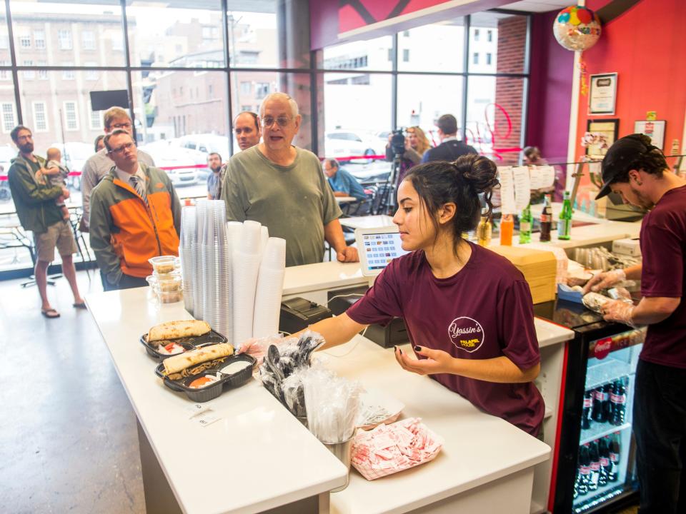 A line begins to form at lunchtime at Yassin's Falafel House in downtown Knoxville on Thursday, October 11, 2018.