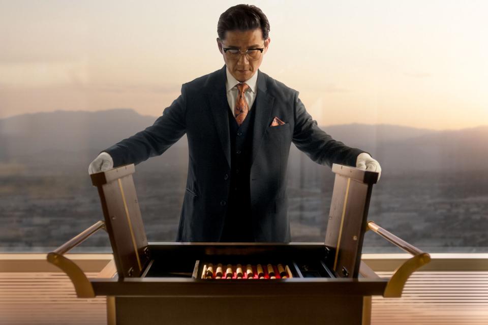 Cigar butler with case of cigars at Aria Sky Villa