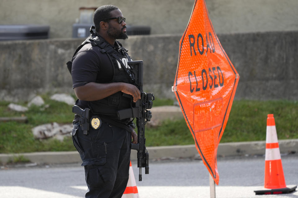 A law enforcement officer stands guard as the search for escaped convict Danelo Cavalcante continues in Pottstown, Pa., Tuesday, Sept. 12, 2023. (AP Photo/Matt Rourke)