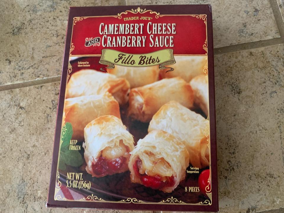 trader joes cheese and cranberry bites in red box on kitchen counter