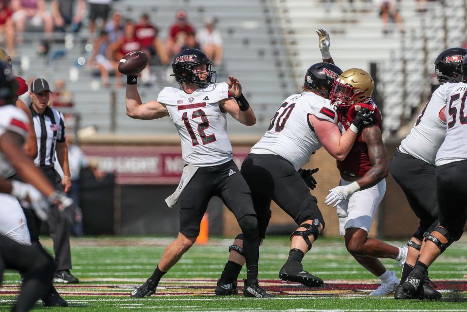 Northern Illinois Huskies quarterback Rocky Lombardi passes the ball during the game against the Boston College Eagles.