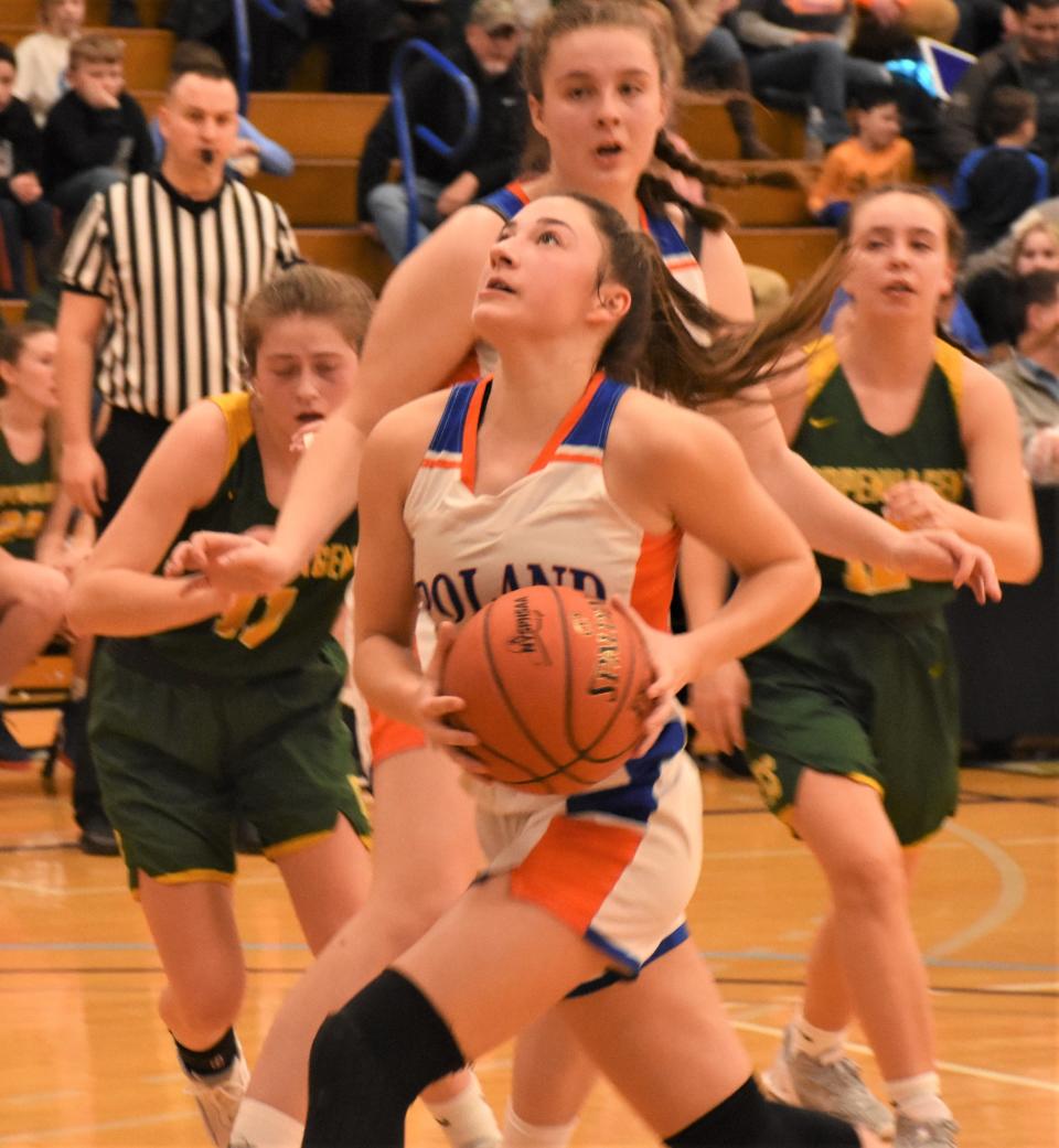 Poland's Maddison Haver drives to the basket against the Copenhagen Golden Knights during Saturday's Section III semifinal at Allyn Hall in Syracuse. Haver matched her season and career high with 17 points in the that put the Tornadoes in the Class D final for the second straight season.