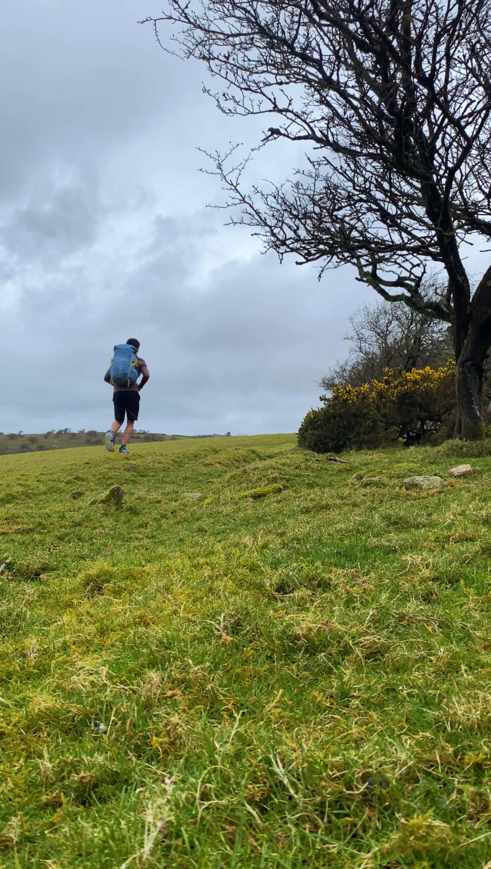 James Norman running up a hill 