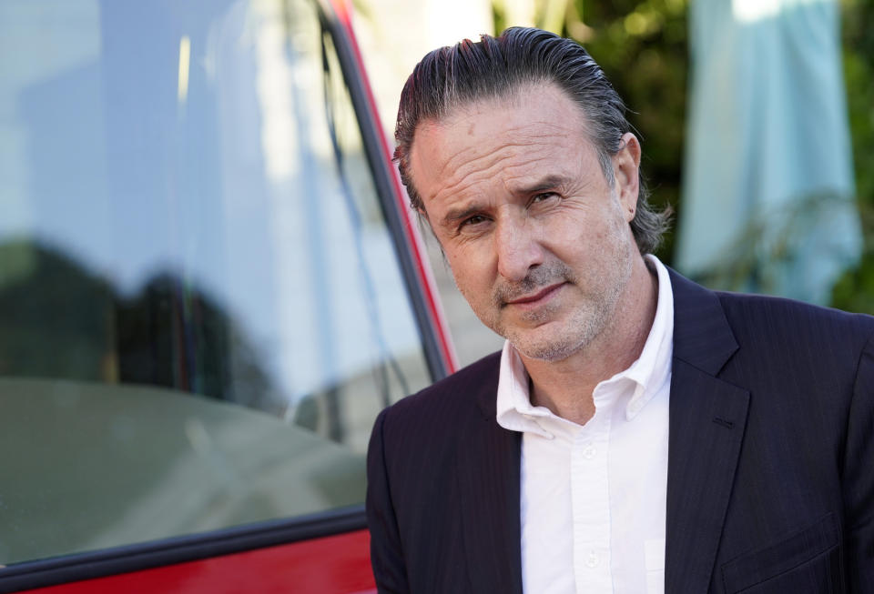 FILE - David Arquette, a cast member in "Domino: Battle of the Bones," poses at the premiere of the film on June 9, 2021, in Los Angeles. Arquette turns 51 on Sept. 8. (AP Photo/Chris Pizzello, File)