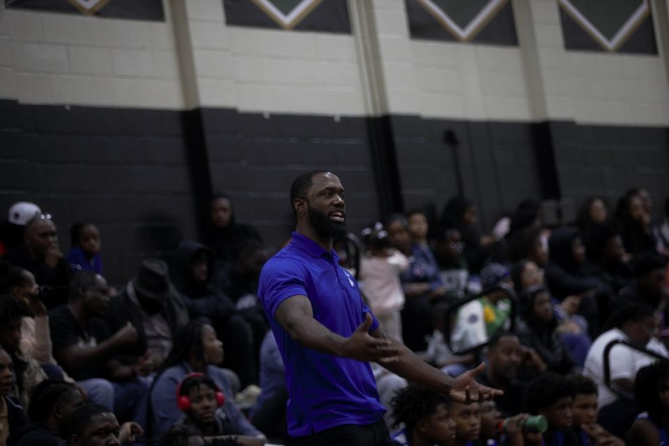 Godby basketball coach Alex Williams coaching on the sideline against Lincoln on Friday, Jan. 12, 2023 at Lincoln High School