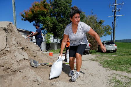 Residents fill sandbags in preparation for tropical storm Nate in New Orleans, Louisiana, U.S., October 6, 2017. REUTERS/Jonathan Bachman