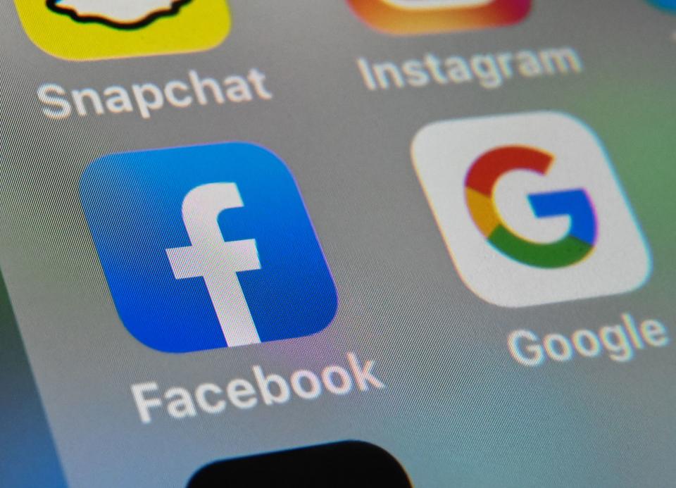 Google and Facebook, control 80% of UK online advertising between them. Photo: Denis Charlet/AFP via Getty Images