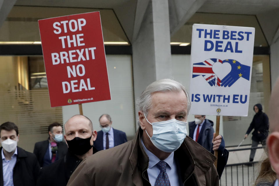 EU chief negotiator Michel Barnier walks with his team to Brexit negotiations at a conference centre in London, on 30 November. Photo: Matt Dunham/AP