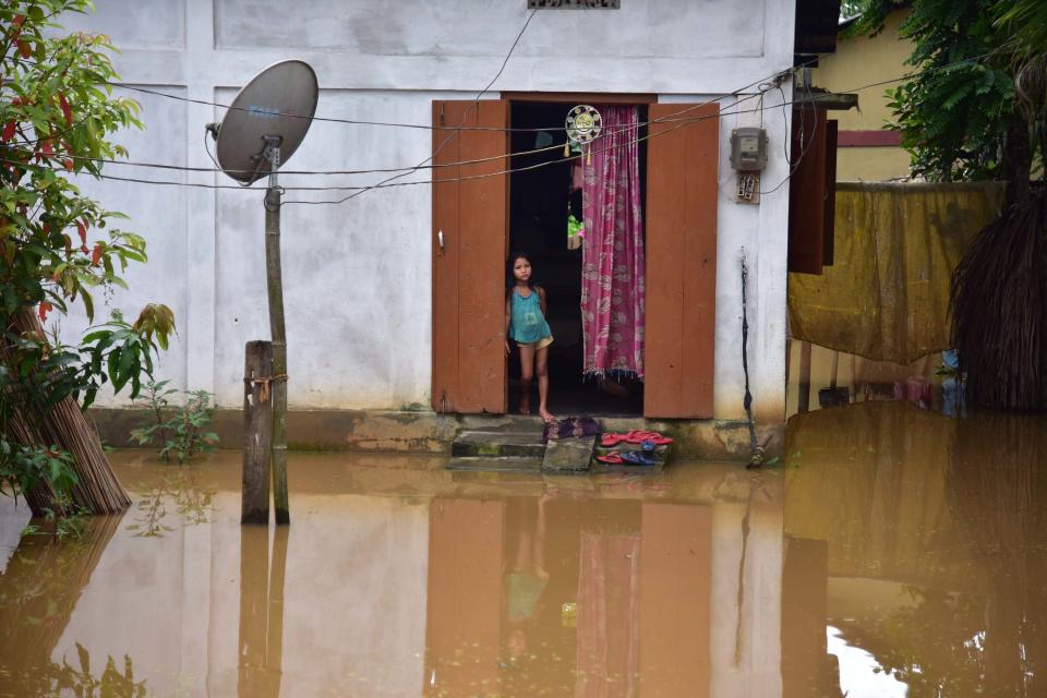 NAGAON,INDIA-JULY 22,2020 :A girl inside her partially submerged hut at a village in Nagaon district of Assam ,India- PHOTOGRAPH BY Anuwar Ali Hazarika / Barcroft Studios / Future Publishing (Photo credit should read Anuwar Ali Hazarika/Barcroft Media via Getty Images)